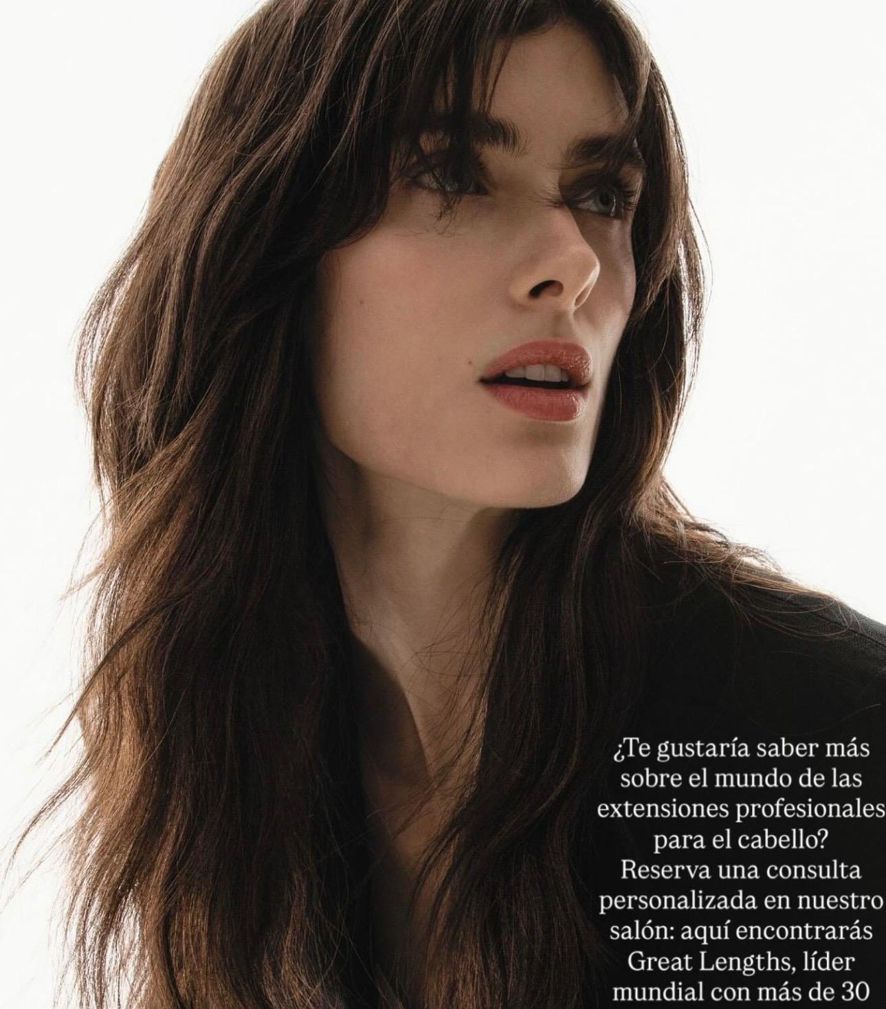 Long layered brunette hair with curtain fringe